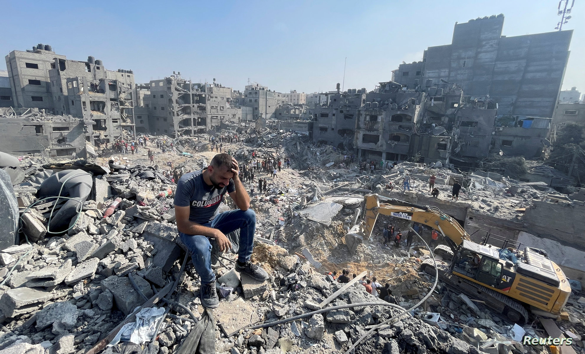 Palestinians search for casualties a day after Israeli strikes on houses in Jabalia refugee camp